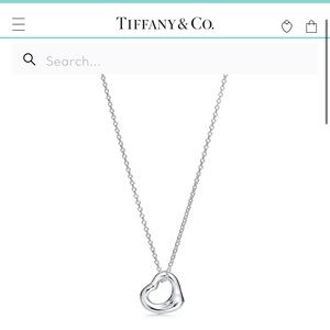 Open heart Tiffany & Co Necklace. Mini pendant.